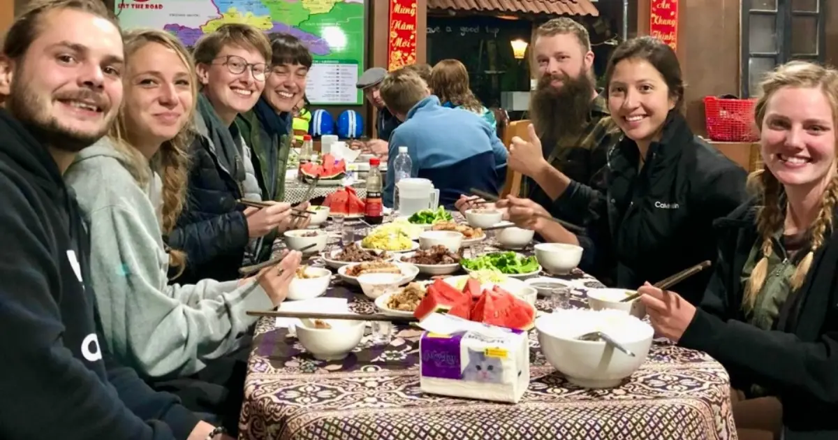 family dinner in ban gioc waterfall in ha giang loop cao bang tour 5 day