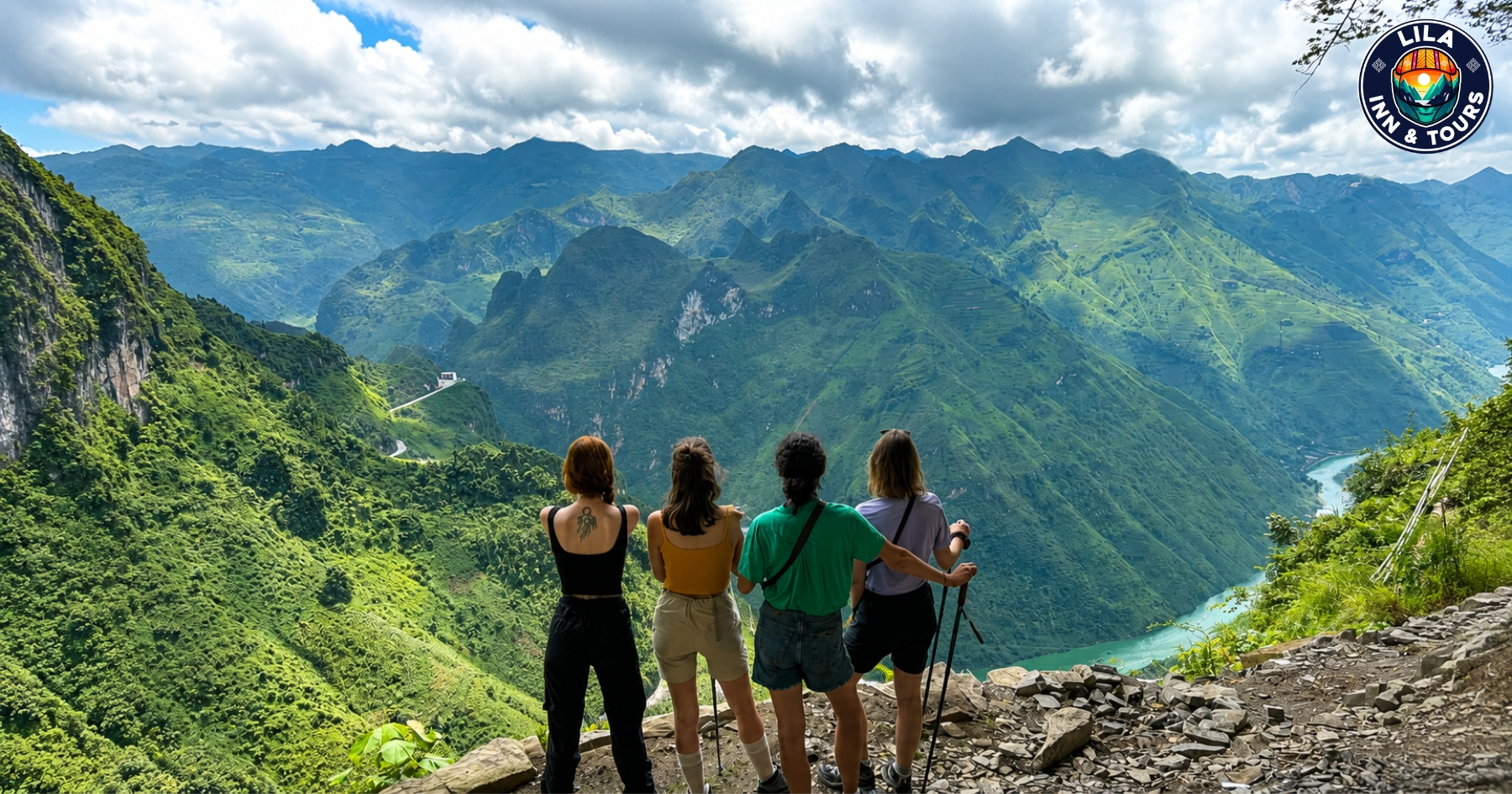 Four female tourists admire the lush green mountain ranges and the Nho Que River